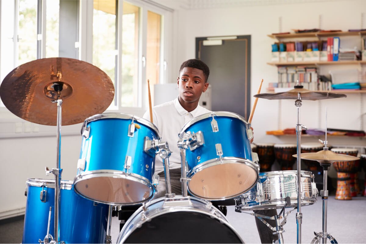 male-teenage-pupil-playing-drums-in-music-lesson-2022-03-30-20-23-47-utc.jpg male-teenage-pupil-playing-drums-in-music-lesson-2022-03-30-20-23-47-utc.jpg